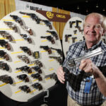 Bob Deubell with one of several Colt displays.